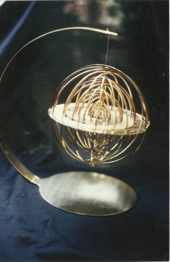 metal cut geometric hemisphere suspended